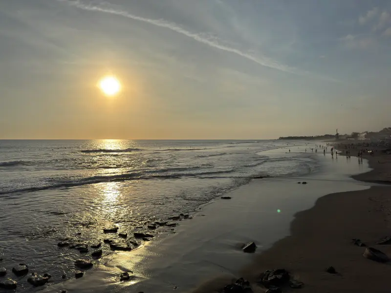 Sunset reflecting on the wet sand at Echo Beach